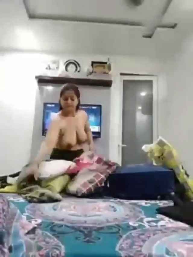 A hot desi bhabi is secretly recorded changing her dress in this leaked nude mms