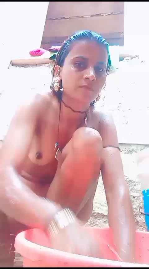 Beautiful village girl caught nude bathing outside in this real mms Beautiful village girl caught nude bathing outside in this real mms